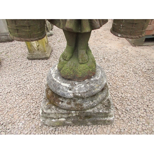 146 - Cast-iron figure of water girl on stone plinth