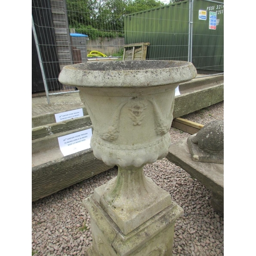 157 - Pair of reconstituted stone swaggered urns on plinths - Approx Height: 97cm Diameter: 43cm