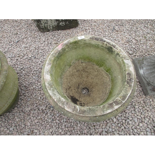169 - A pair of stone planters