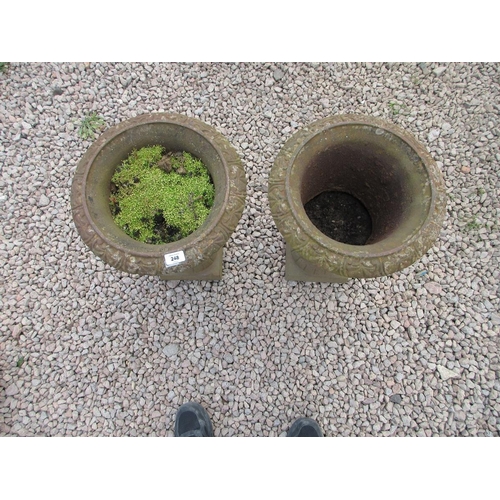 248 - Pair of small cast-iron urns