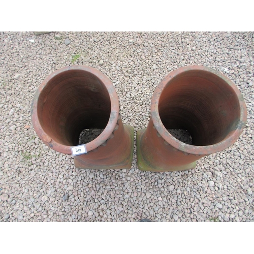 249 - Pair of terracotta chimney pots with decorative tops - Approx Height: 70cm