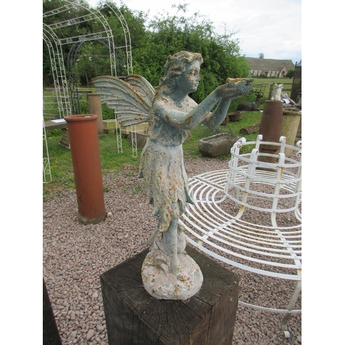 305 - Set a 4 cast iron fairies on seasoned oak plinths - Approx Height: 138cm