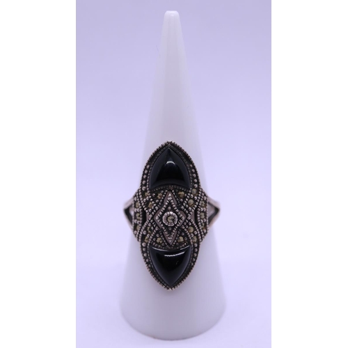 26 - Silver marcasite and onyx ring