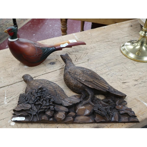 371 - Carved pheasant wall plaque together with a wooden carved pheasant