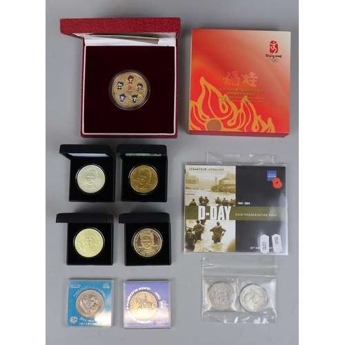 87 - Collection of commemorative coins to include Beijing Olympics 2008