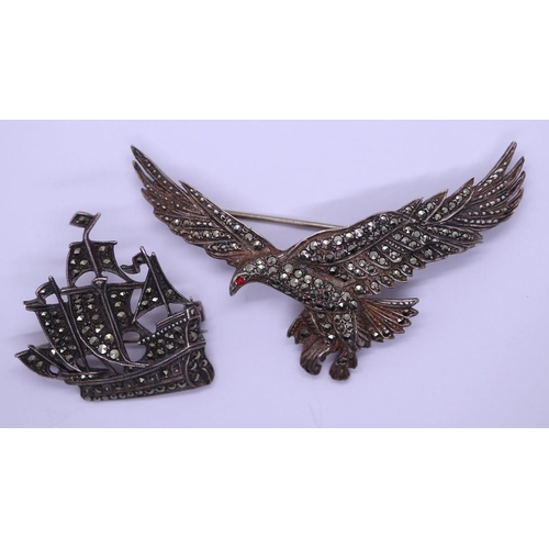 9 - 2 Marcasite brooches - one in the form of an eagle the other a ship