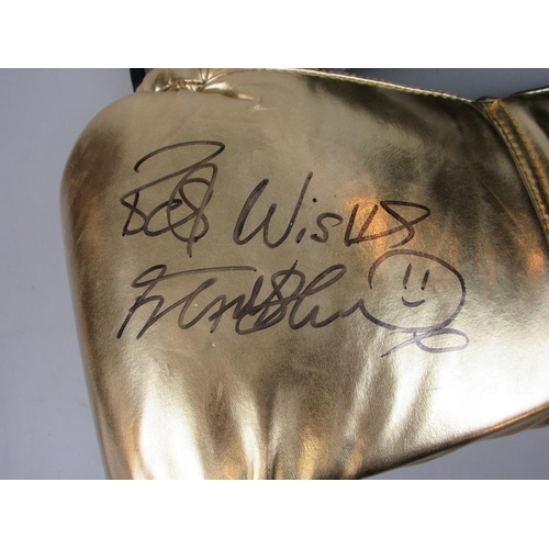 154 - Frank Bruno signed boxing glove with another