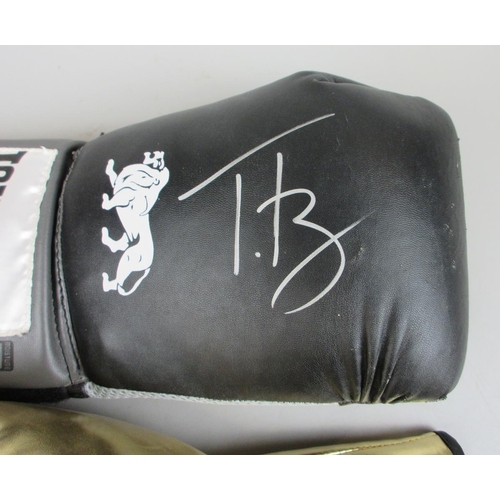 154 - Frank Bruno signed boxing glove with another
