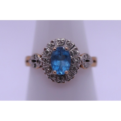 18 - 9ct blue topaz & diamond cluster ring - Size M