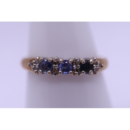 20 - 9ct gold diamond and sapphire ring - Size O