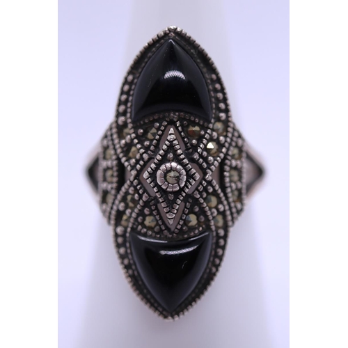 26 - Silver marcasite and onyx ring
