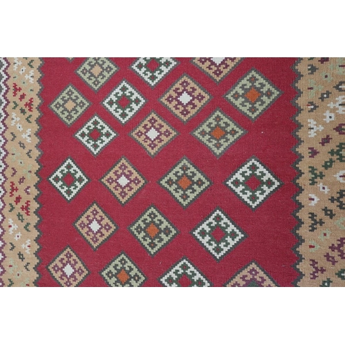 281 - Large red patterned rug - Approx size 265cm x 165cm