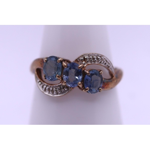 29 - 9ct gold tanzenite & diamond set ring - Size M½