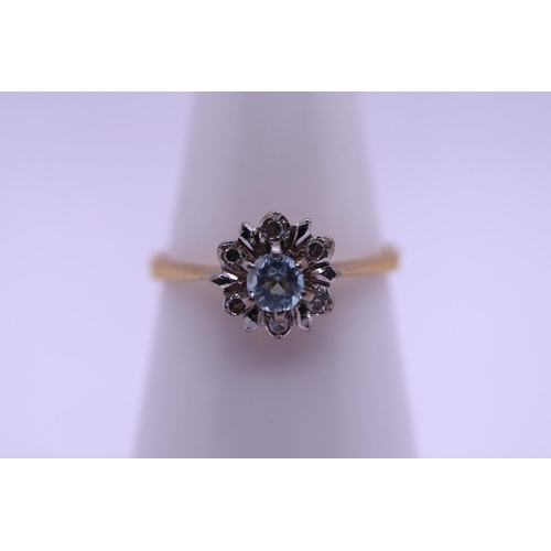 44 - 18ct gold aquamarine and diamond ring - Size N½