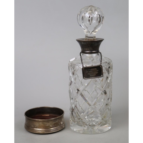 1 - Hallmarked silver coaster together with glass decanter with silver collar and silver decanter label