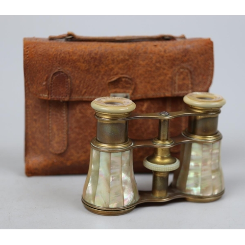 125 - 1881 Geo. W. Biggs, Pittsburgh,USA, brass and mother-of-pearl opera glasses in leather case.