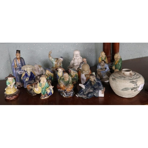 202 - Collection of mud men figurines etc