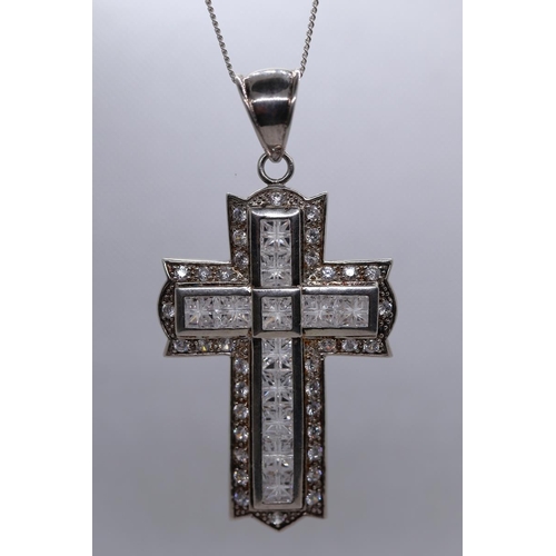 24 - Large silver stone set cross on chain