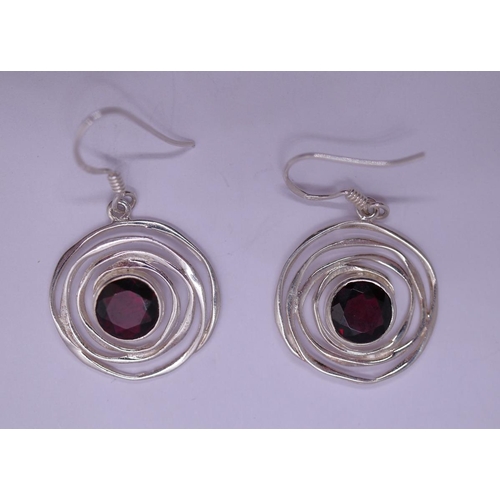 28 - Pair of silver and garnet earrings