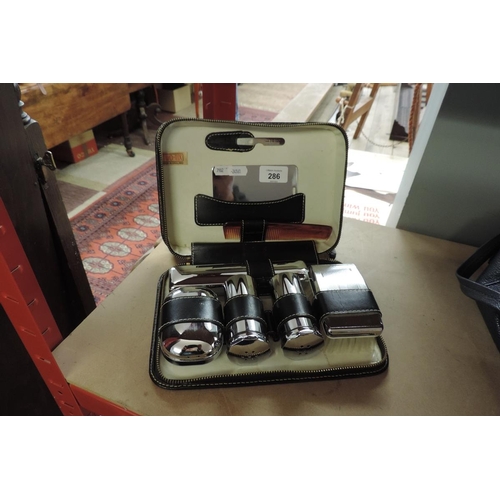 286 - Gentleman's cased vanity set