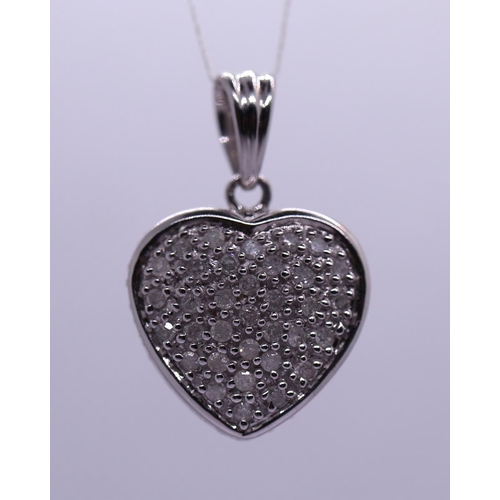 29 - White gold diamond heart pendant