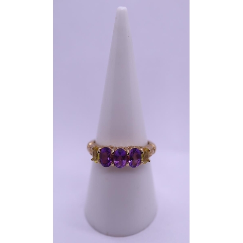 37 - 9ct gold amethyst and yellow sapphire set ring - Size N