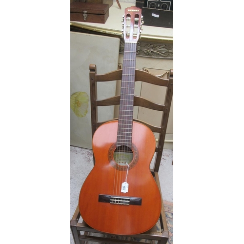 462 - 6 string acoustic Suzuki guitar.