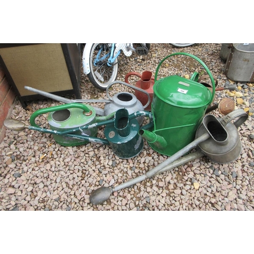 506 - Collection of vintage watering cans