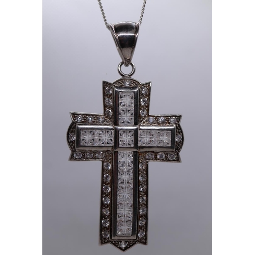24 - Large silver stone set cross on chain