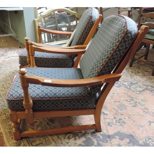 467 - Ercol - Pair of pine easy chairs