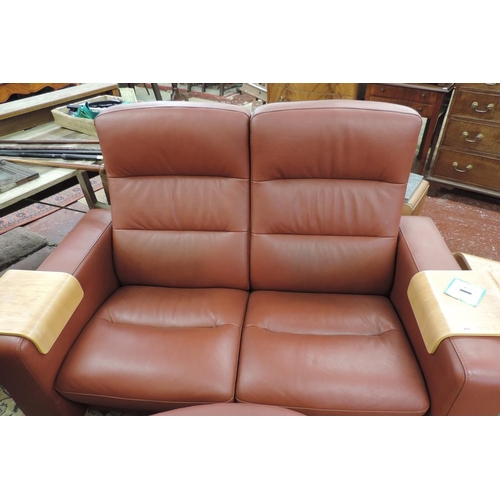 499 - Stressless reclining 2 seater sofa with table and footstool