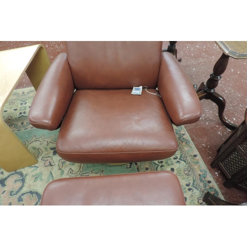 500 - Stressless reclining armchair with matching footstool