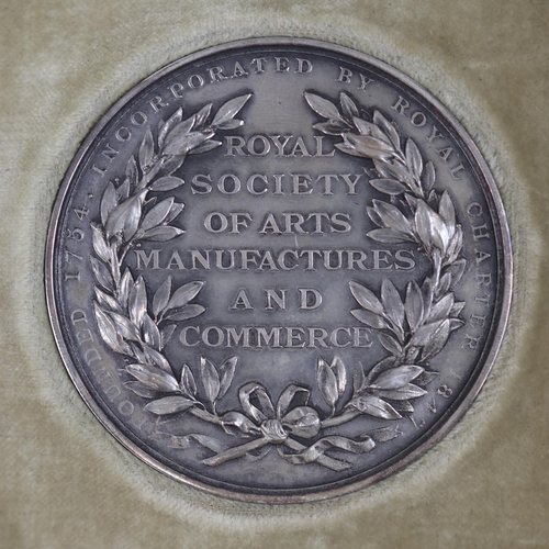 98 - Silver Royal Society of Arts manufactures of commerce silver medalion together with a Royal Geograph... 