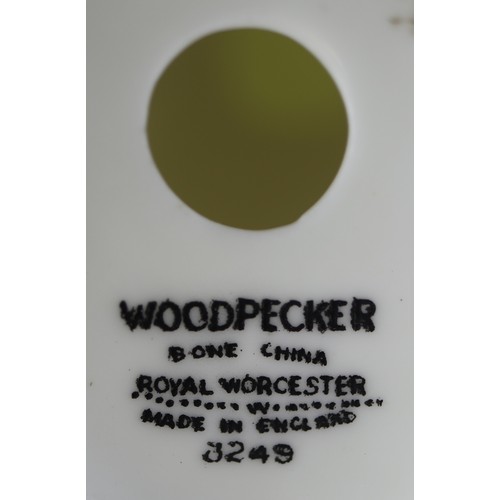 200 - Royal Worcester ceramic wood pecker together with a duck