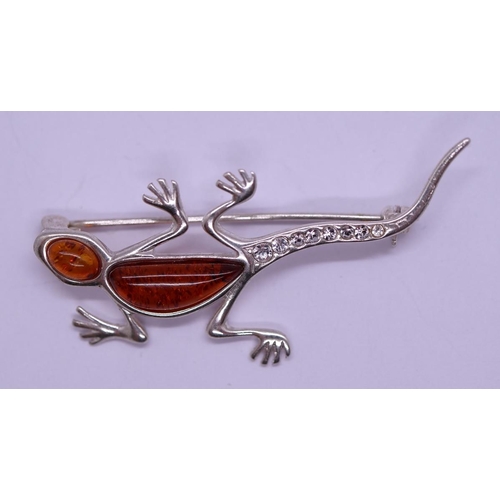 23 - Silver and amber lizard brooch