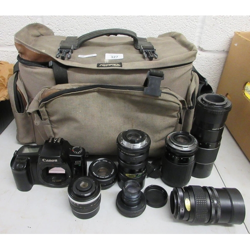 327 - Canon camera EOS1000F with a quantity of lenses in its original carrying case