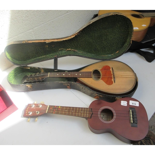 415 - Mandolin in original case together with a Makala ukulele