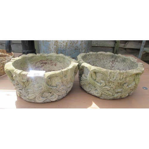 479 - Two small round stone planters