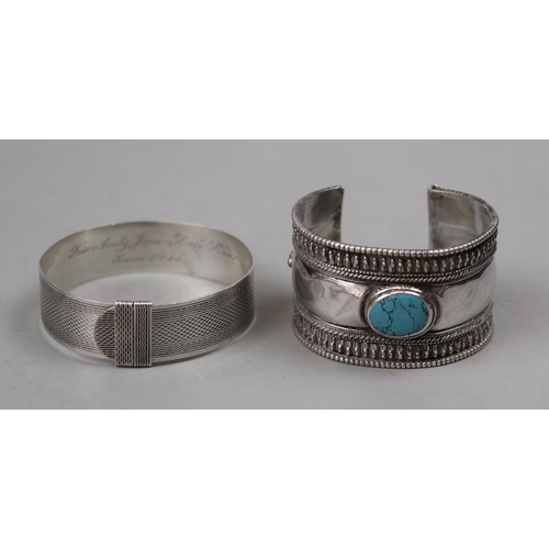 68 - Silver buckle bangle, hallmarked London 1945, and 1 Tibetan silver bangle - Approx gross weight 81g