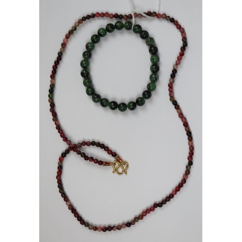 72 - Watermelon tourmaline bead necklace with yellow metal clasp together with a bracelet also of waterme... 