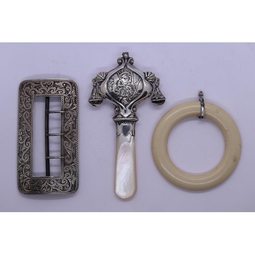 9 - Silver hallmarked belt buckle and hallmarked silver Victorian baby's rattle with mother of pearl han... 