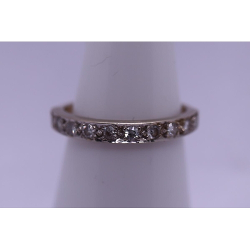 22 - 18ct gold half hoop diamond ring set with lovely bright diamonds - Size M