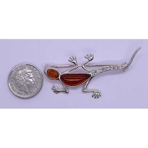 23 - Silver and amber lizard brooch