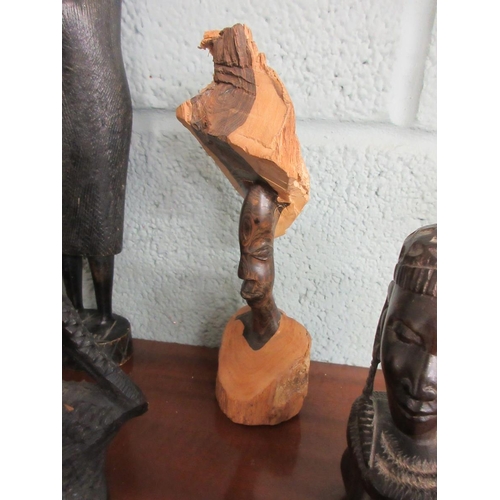 297 - Collection of carved African figurines