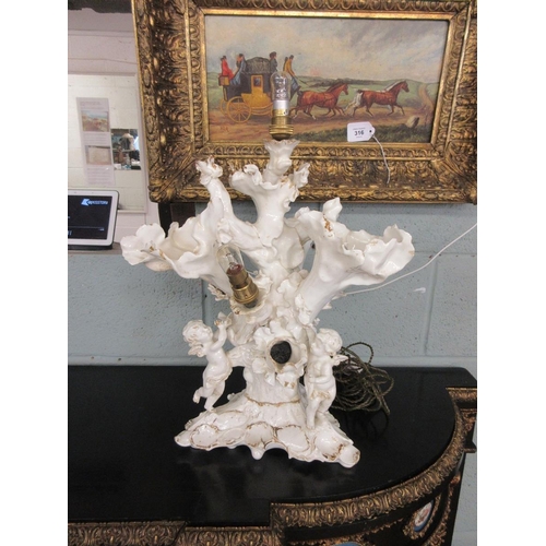 312 - Decorative ceramic cherub lamp