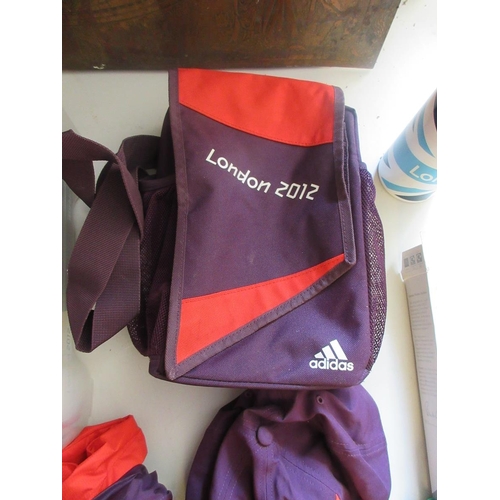 408 - Good collection of London 2012 Olympic/Paralympic collectables to include uniform, baton, shoes (siz... 