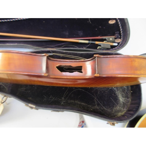 417 - 2 violins one marked Stradivarius