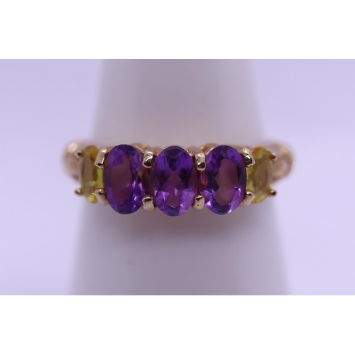 43 - 9ct gold amethyst and yellow sapphire set ring with COA - Size N