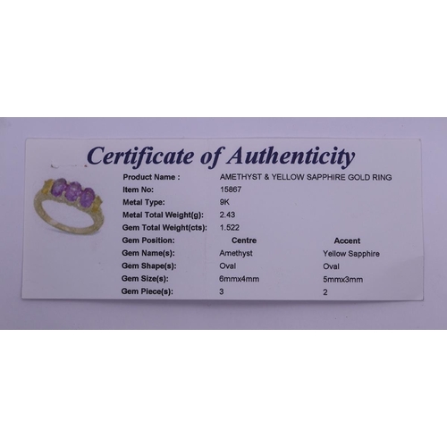 43 - 9ct gold amethyst and yellow sapphire set ring with COA - Size N