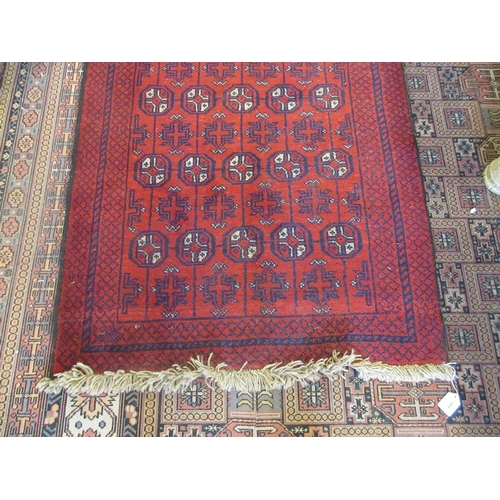 440 - Small red patterned rug - Approx size 150cm x  88cm.